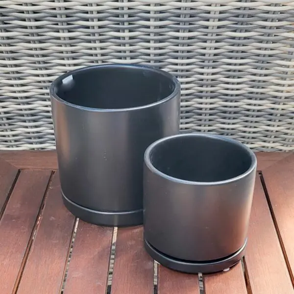 Matte black planter with attached drip tray